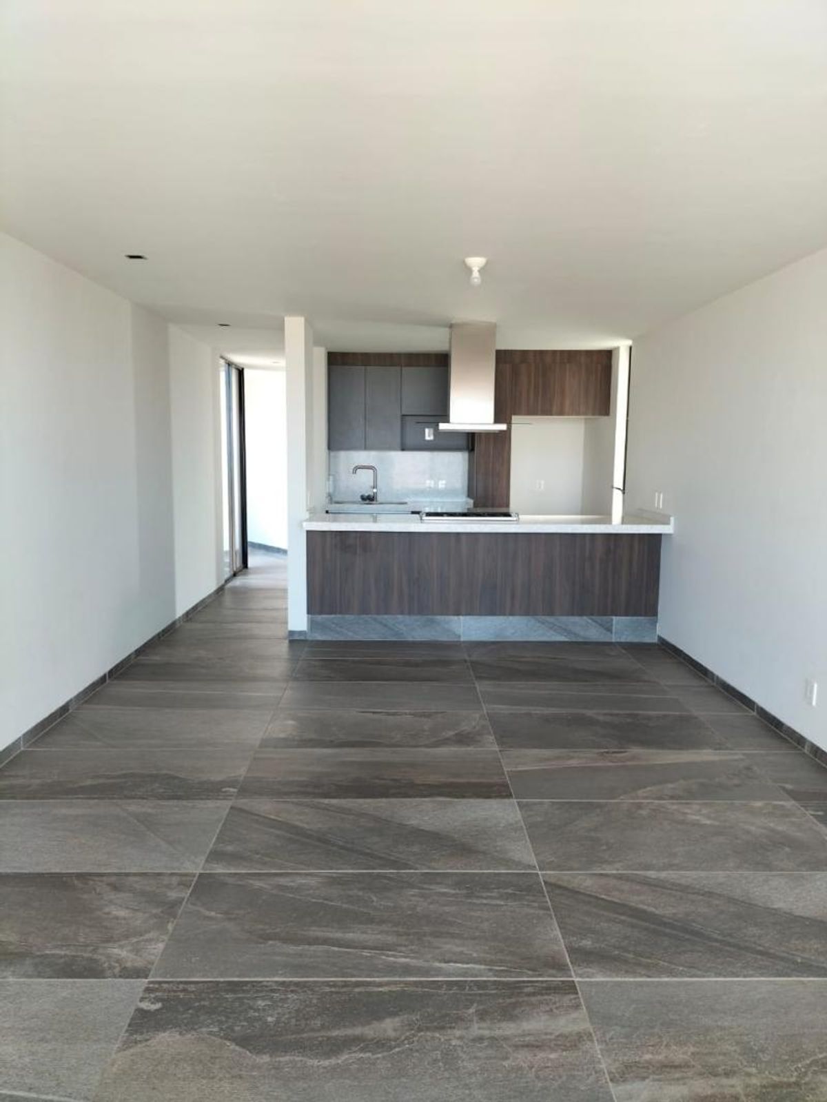 Fotografía de DEPARTAMENTO EN VENTA EN LOMAS DEL PEDREGAL CON VISTA A LA CIUDAD