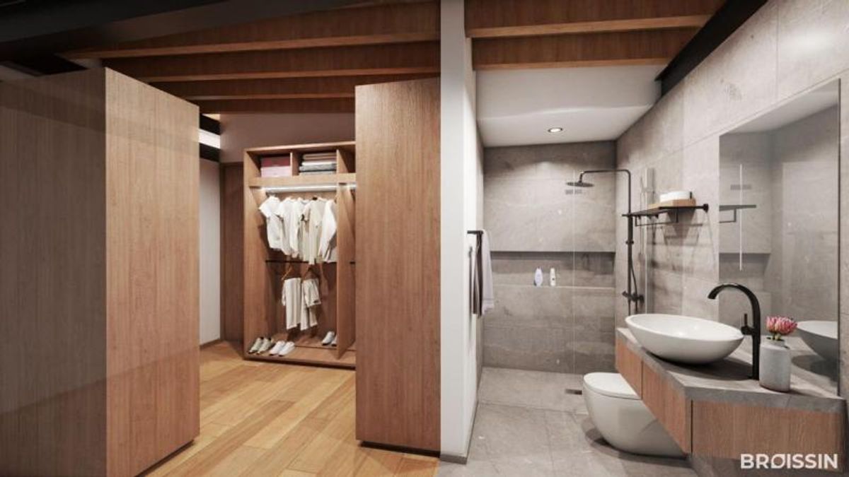 Baño con lavabo ovalado de sobreponer y vestidor abierto con acabados de madera