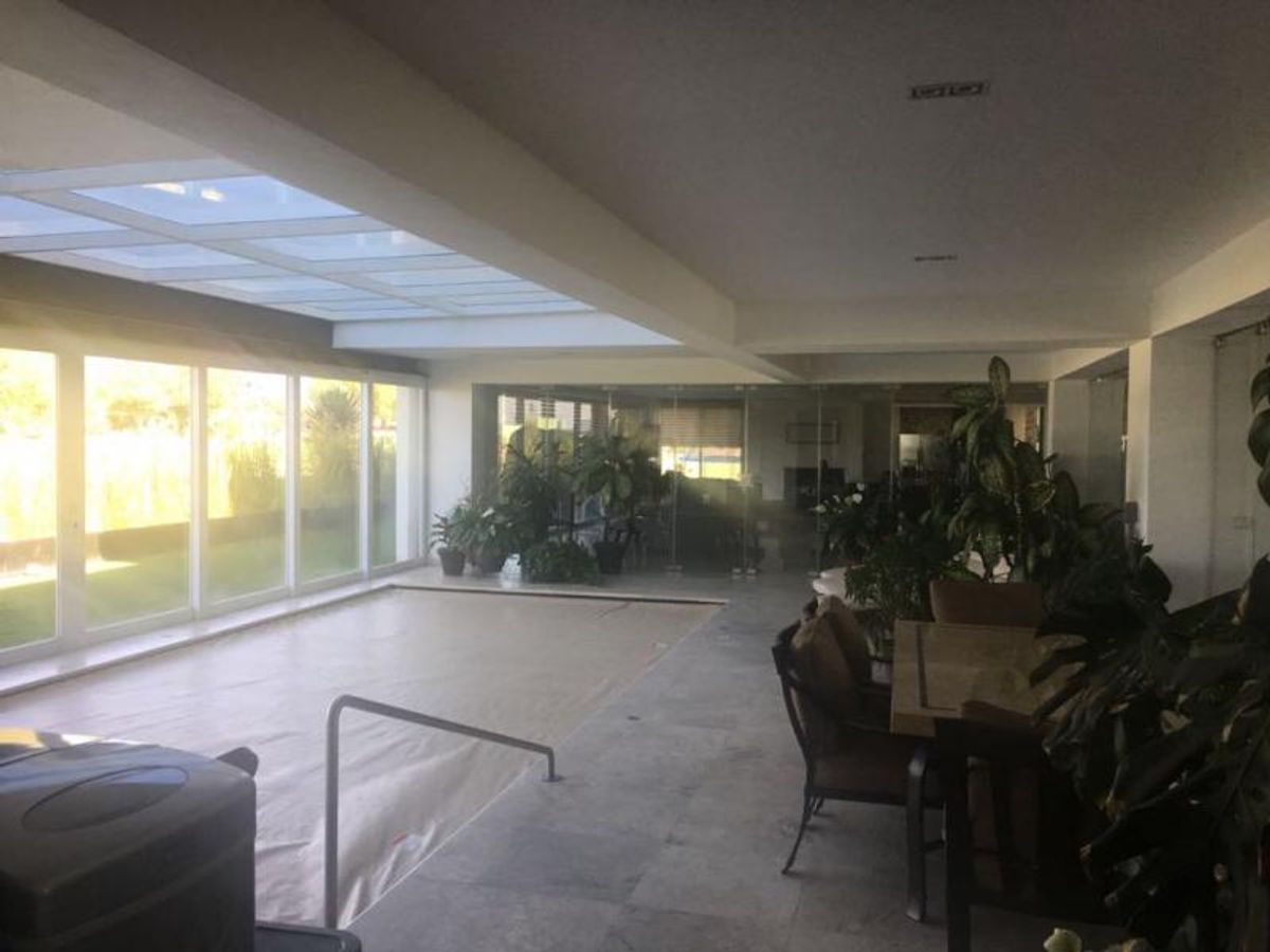 Fotografía de CASA EN VENTA EN LA LOMA CLUB DE GOLF CON 1180 M2 DE CONSTRUCCIÓN, 6 RECAMARAS CON BAÑO COMPLETO Y  EXCELENTE UBICACIÓN