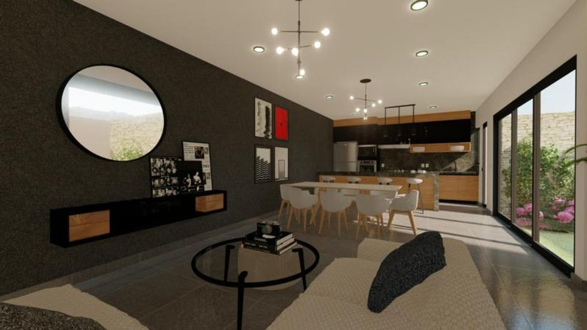 Sala y comedor integrados con muro oscuro, cocina al fondo y ventanales al jardín