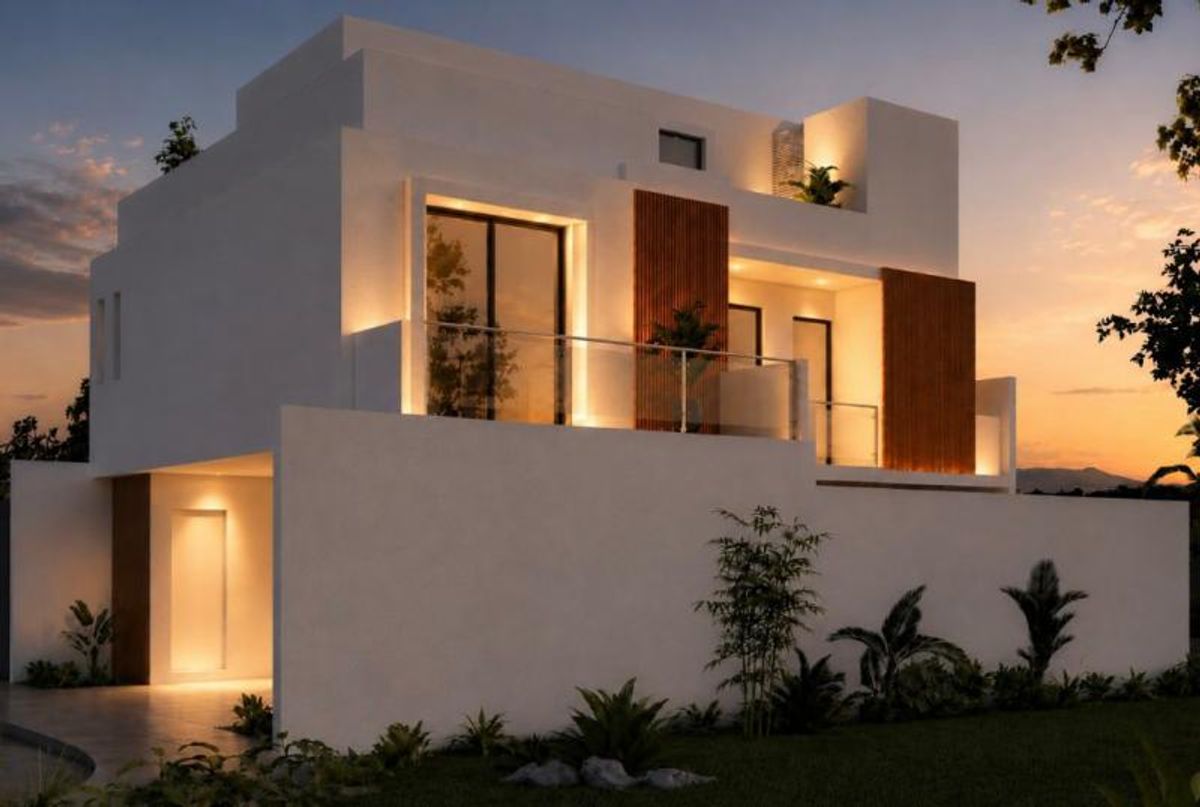 Casa moderna de fachada blanca con detalles de madera, iluminación cálida exterior y balcón