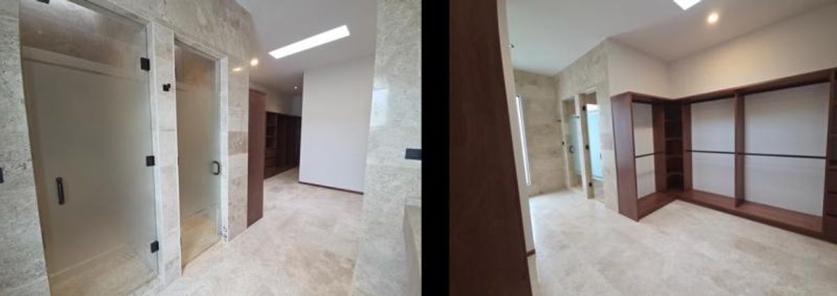 Vestidor con estantería de madera y baño con acabados de mármol y cristal opaco