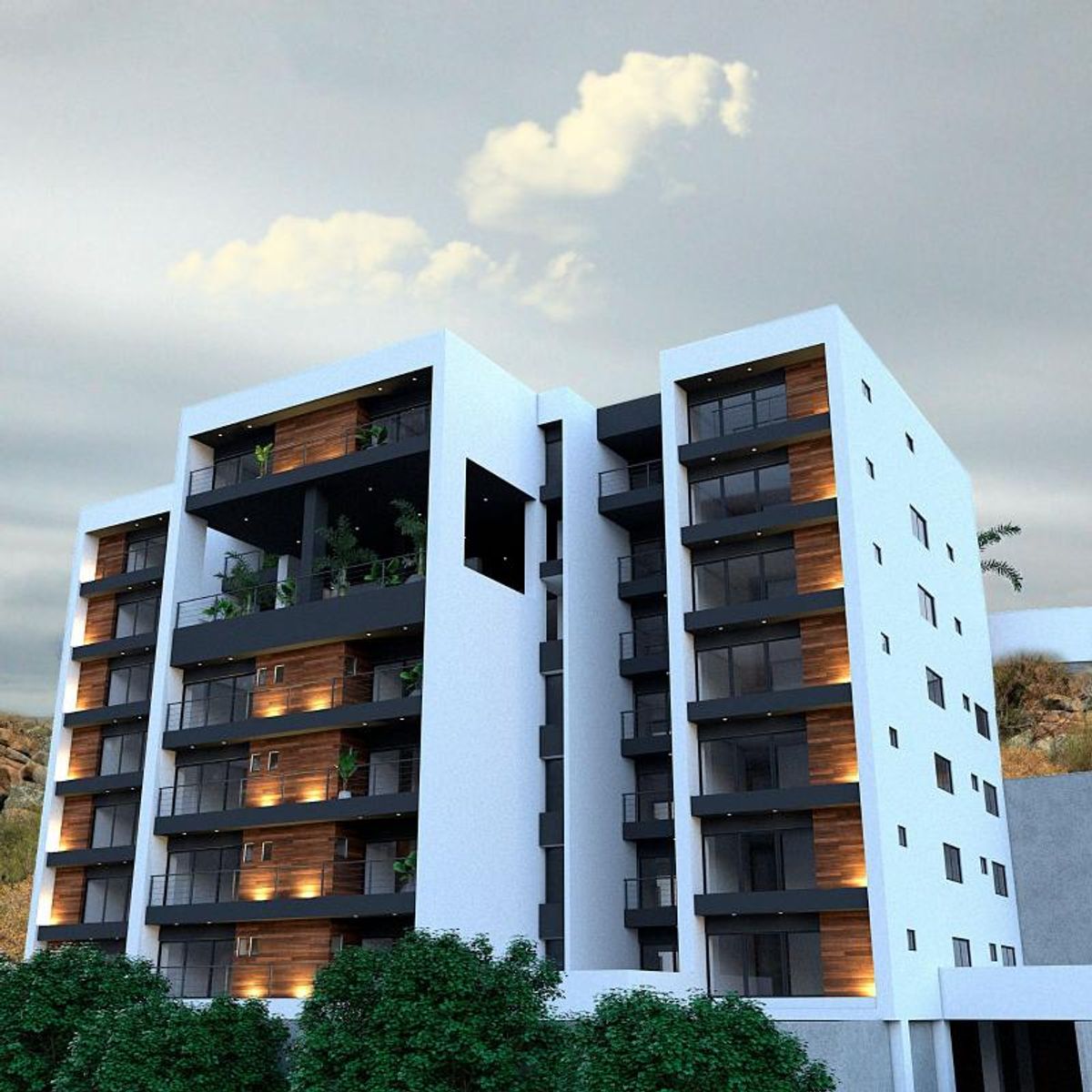 Edificio de departamentos con fachada blanca, paneles de madera, balcones e iluminación cálida integrada