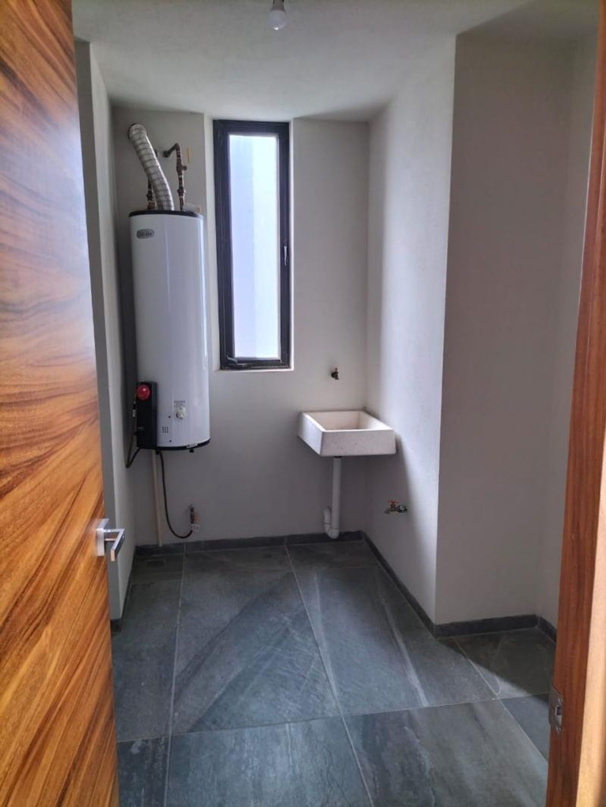 Fotografía de DEPARTAMENTO EN VENTA EN LOMAS DEL PEDREGAL CON VISTA A LA CIUDAD