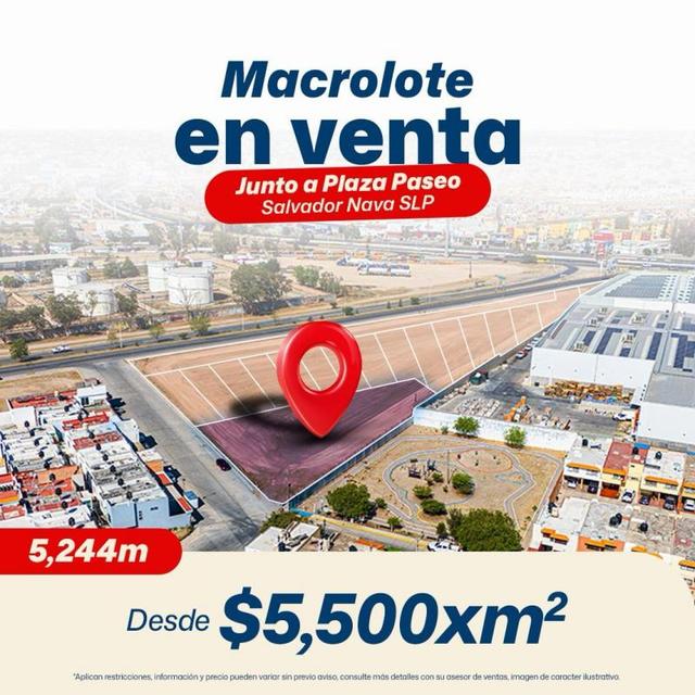 Terreno plano delimitado con un pin rojo junto a avenidas y construcciones urbanas