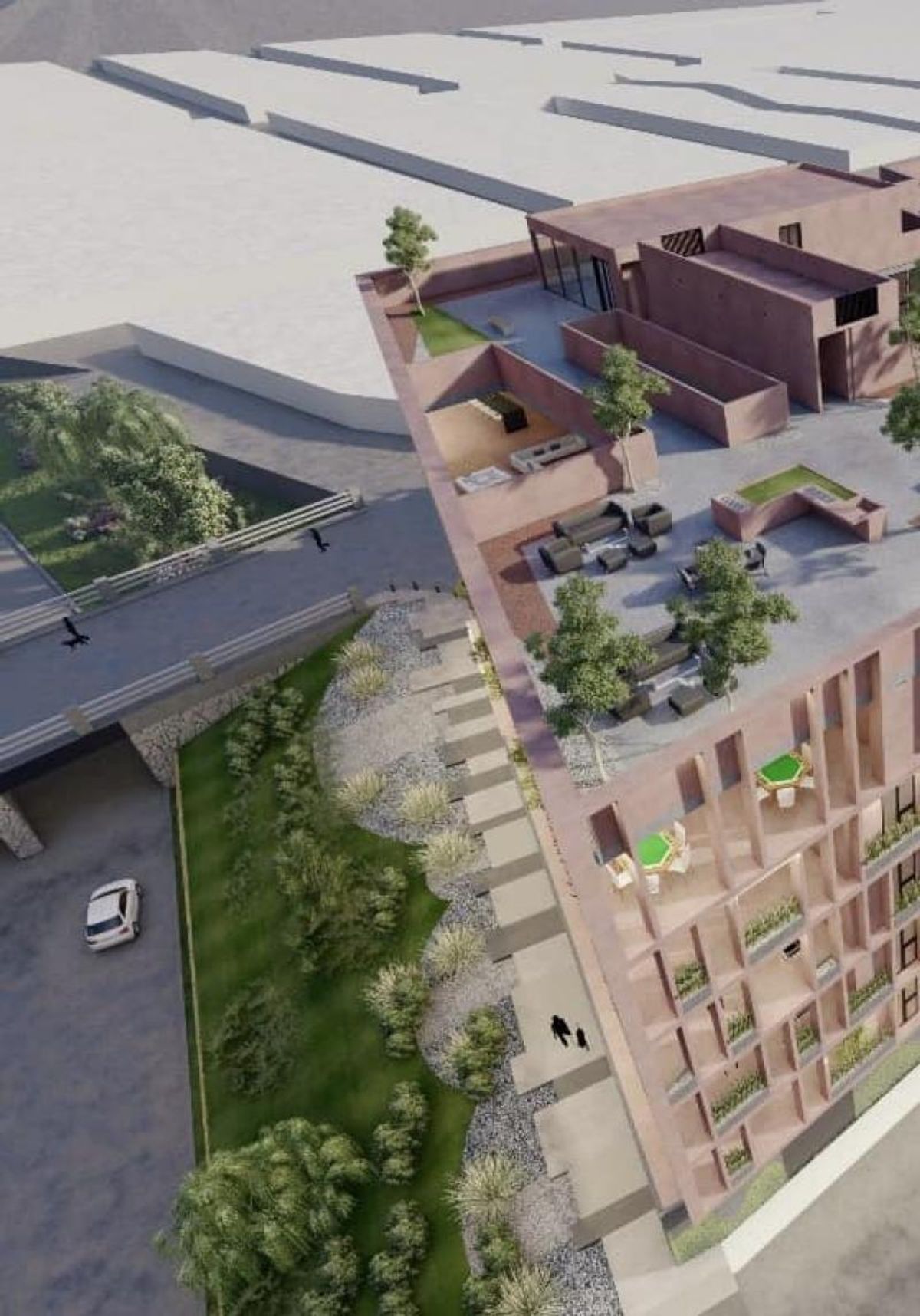 Edificio de tono terracota con terraza superior equipada, balcones y áreas verdes ajardinadas