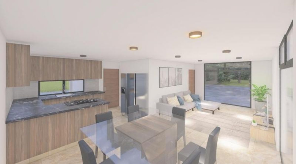 Espacio abierto con cocina integral de madera, comedor de cristal y sala con ventanal