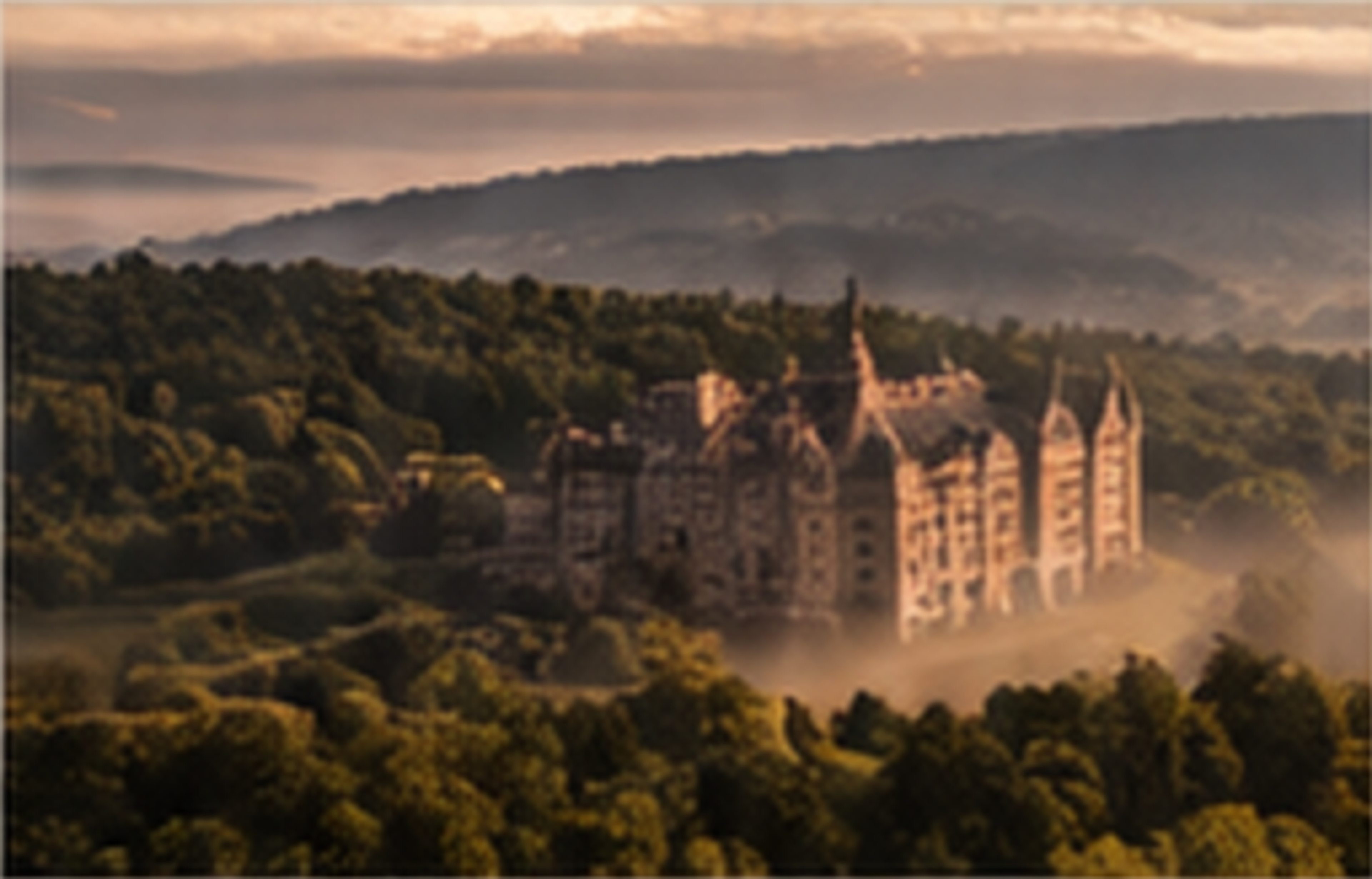 Celtic Manor Resort above autumn woodland