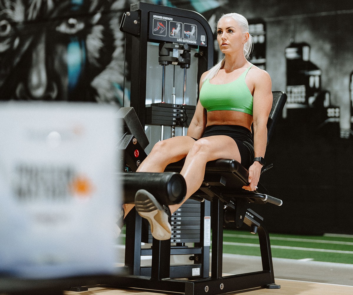 Leg extensions vs squats for quadricep growth