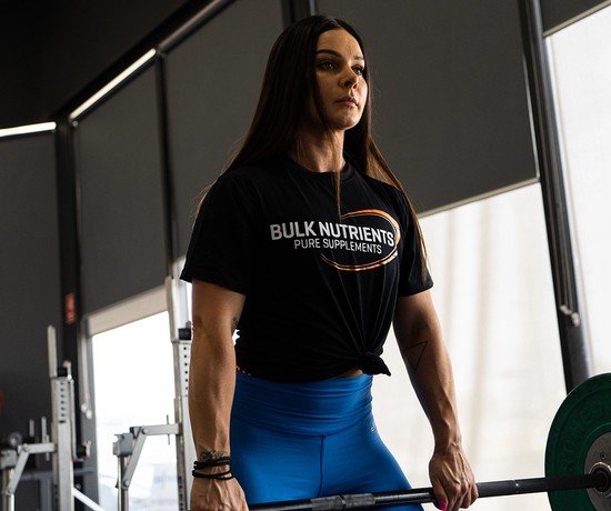 How long should I rest between sets for optimal strength and muscle growth?