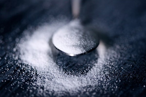 White sugar on a spoon