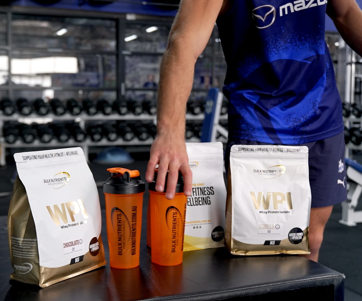 NMFC Player in the gym with Bulk Nutrients HASTA WPI