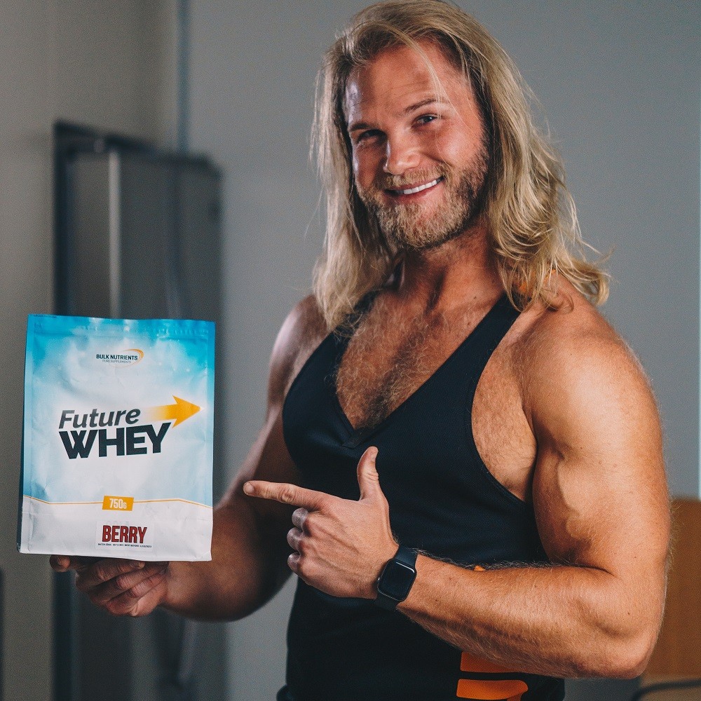 Andy Leigh holding a bag of Future Whey