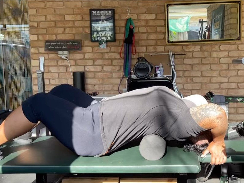 One of the easiest ways to improve your t-spine mobility is to use a foam roller