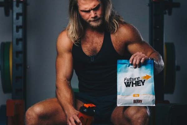 Bulk Ambassador Andy Leigh holding Bulk Nutrient's Future Whey and a shaker. A refreshing way to take protein... Future Whey is now 100% plant based free form amino acids and available in three great flavours (Berry, Cola and Lemonade!). Available in 750g pouches.
