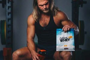 Bulk Ambassador Andrew Lutomski holding Bulk Nutrient's Future Whey and a shaker. A refreshing way to take protein... Future Whey is now 100% plant based free form amino acids and available in three great flavours (Berry, Cola and Lemonade!). Available in 750g pouches.