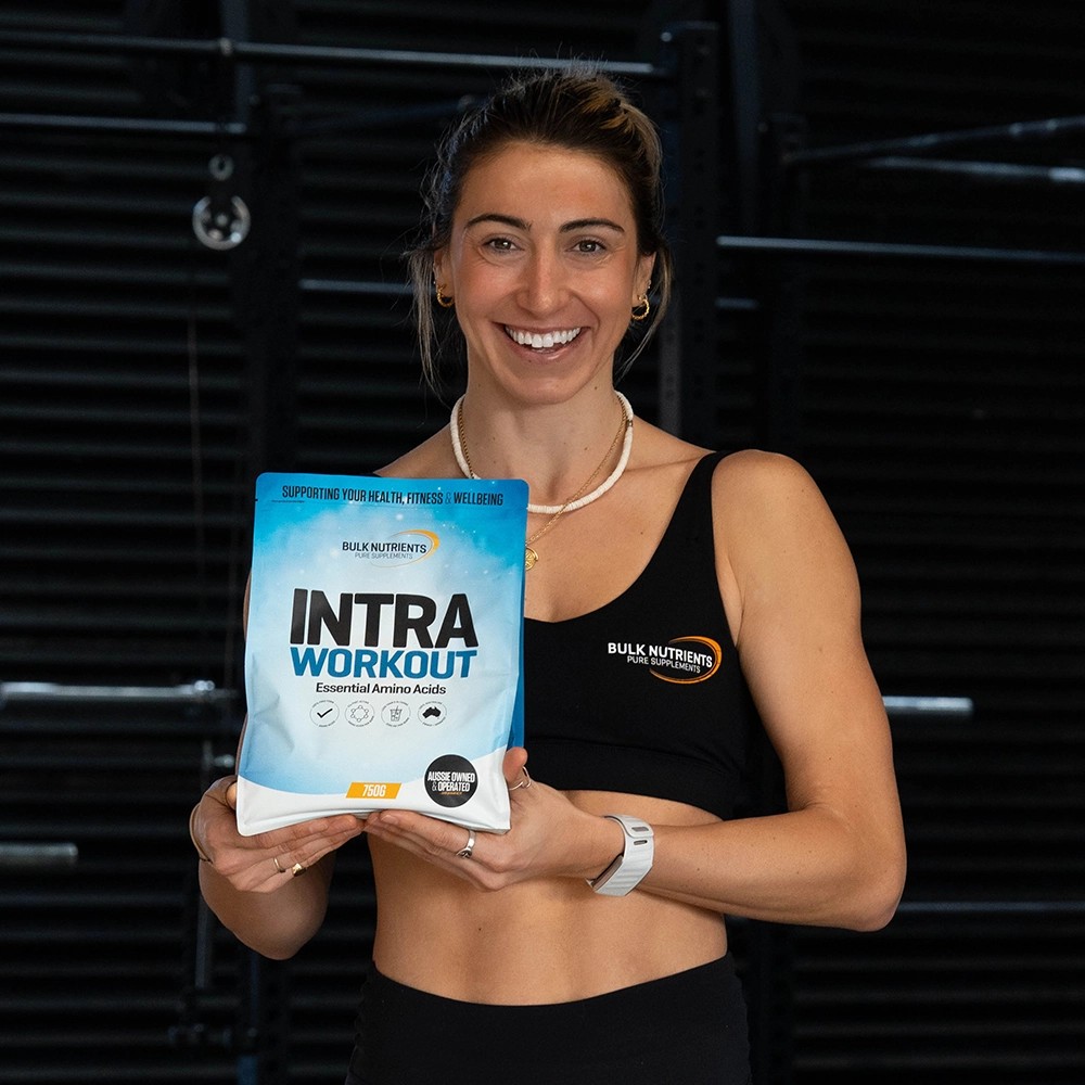 Bulk Nutrients Intra Workout with Nicola MacBeth holding a bag