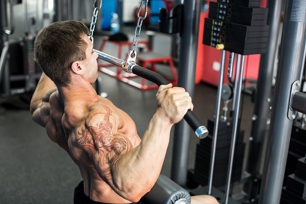 Leaning back during lat pulldowns IS actually beneficial for more activation.