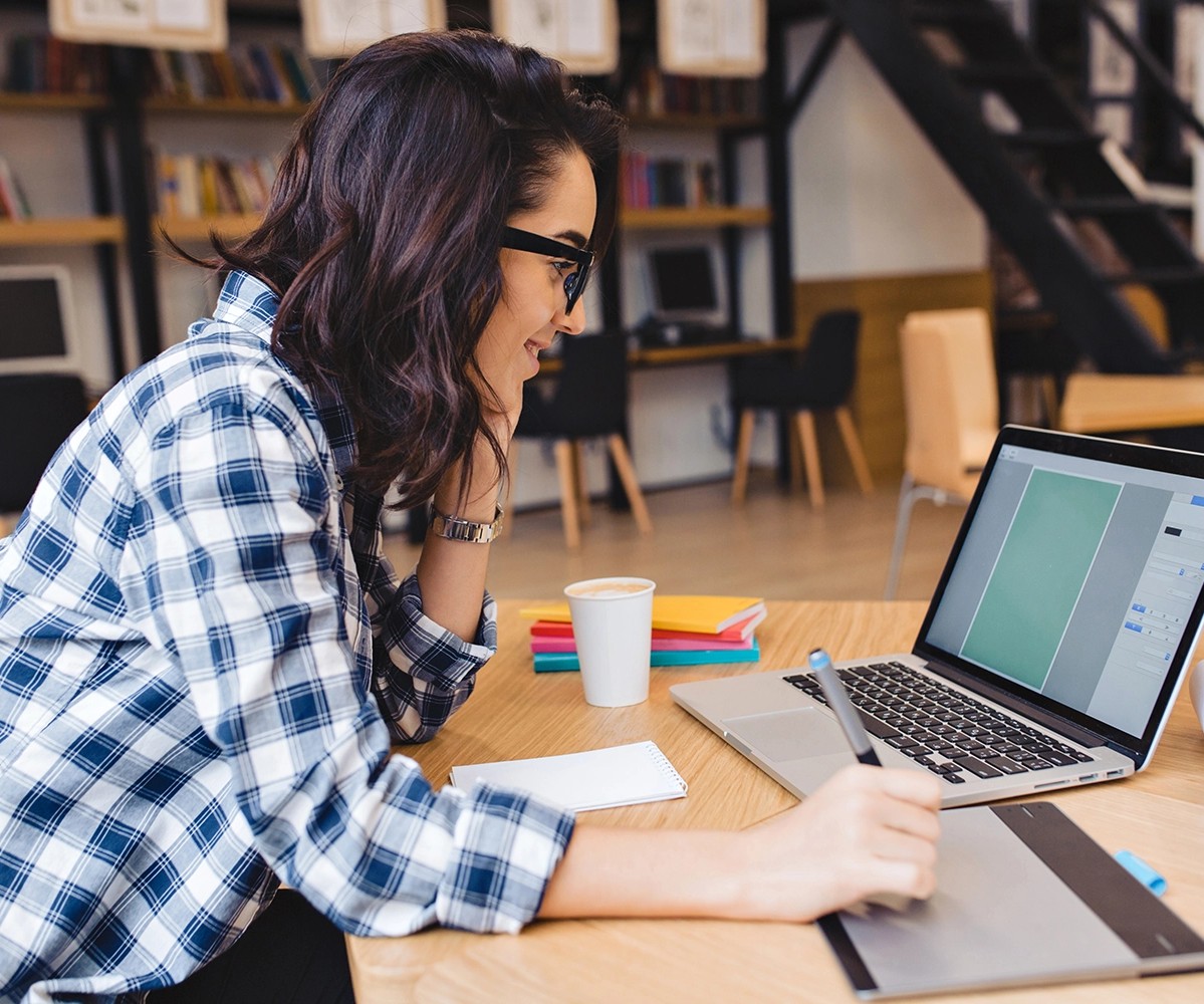 Women studying using a laptop