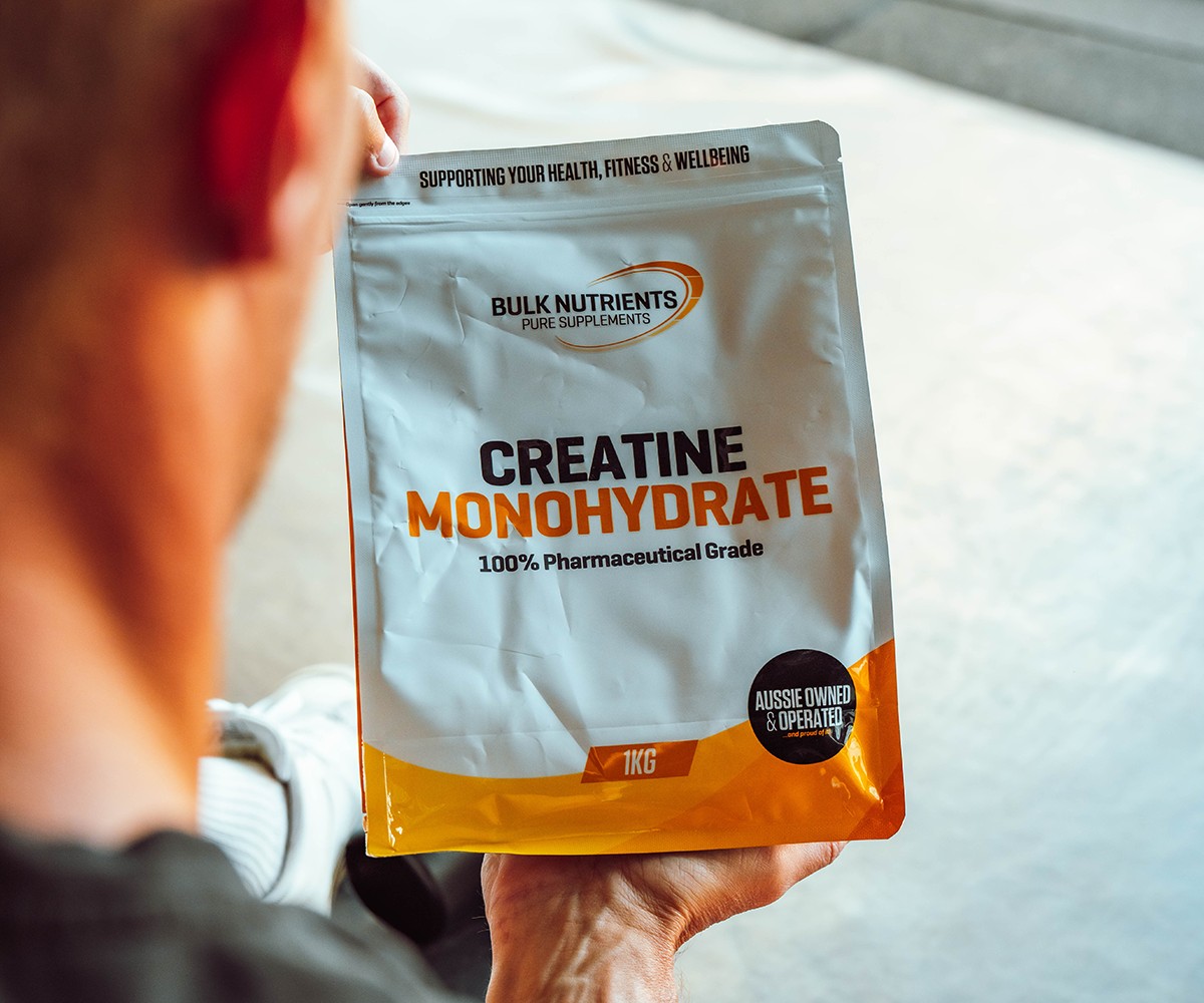 Bulk Ambassadors Helena Sly holding a 1kg pouch of Bulk Nutrient's Creatine Monohydrate. With proven results, Creatine Monohydrate offers great value and can help users gain strength and increase muscle volume. Available in 250g and 1kg pouches.
