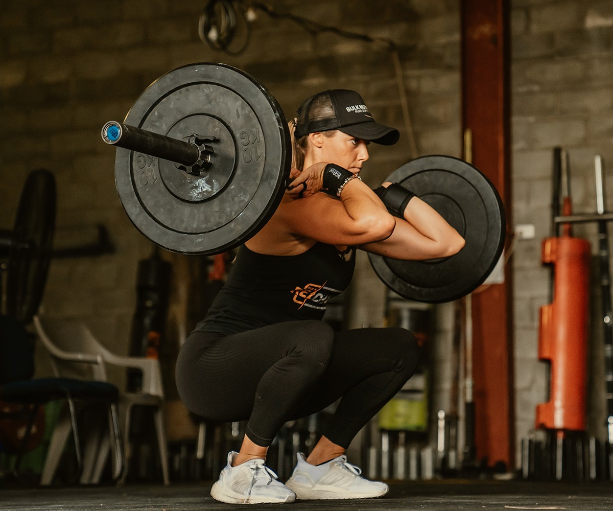 Woman performing front squat