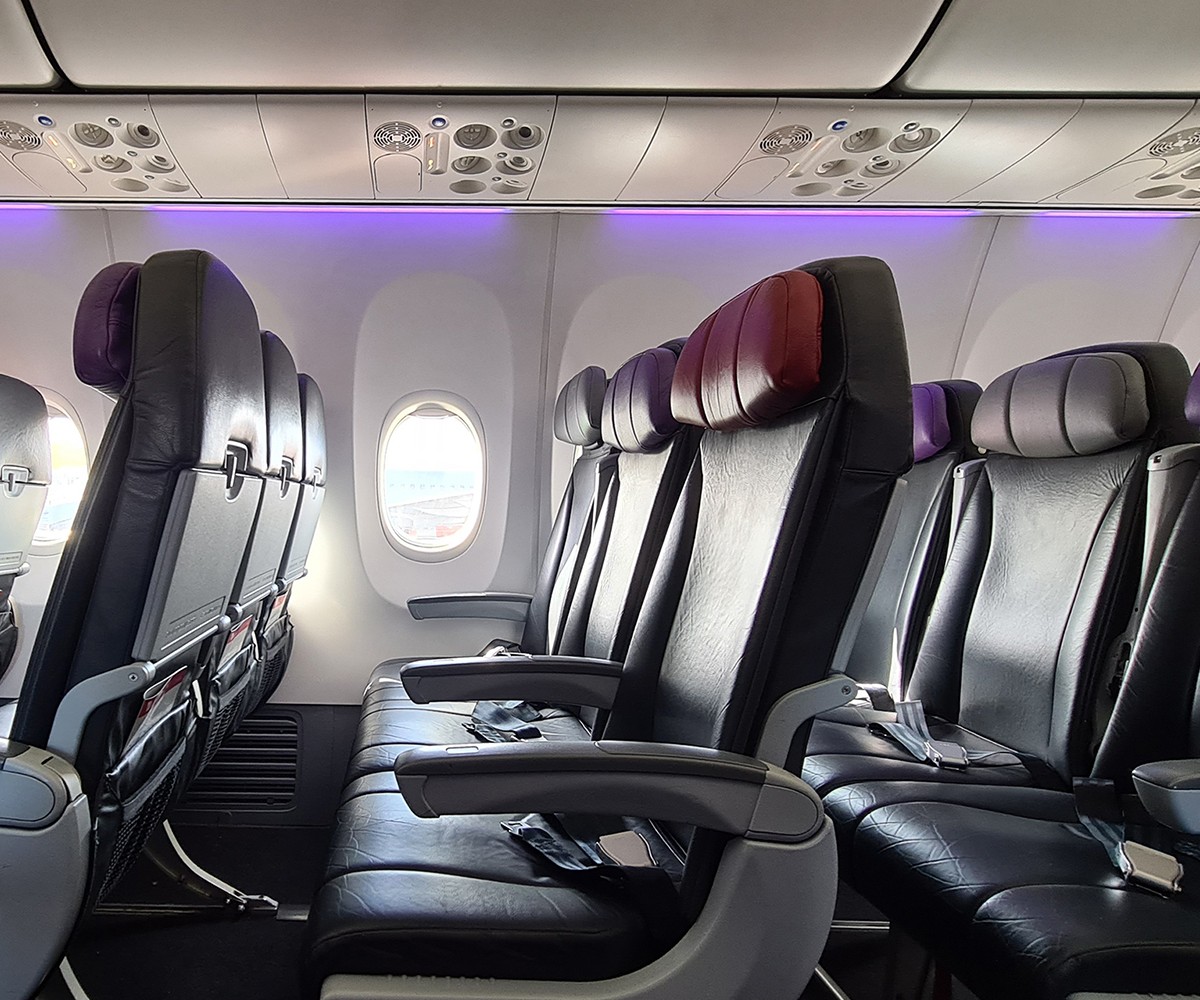 Row of empty seats on a plane