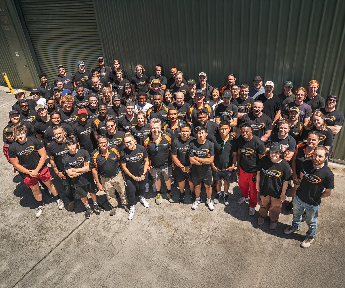 Bulk Nutrients Staff standing in from of the green shed