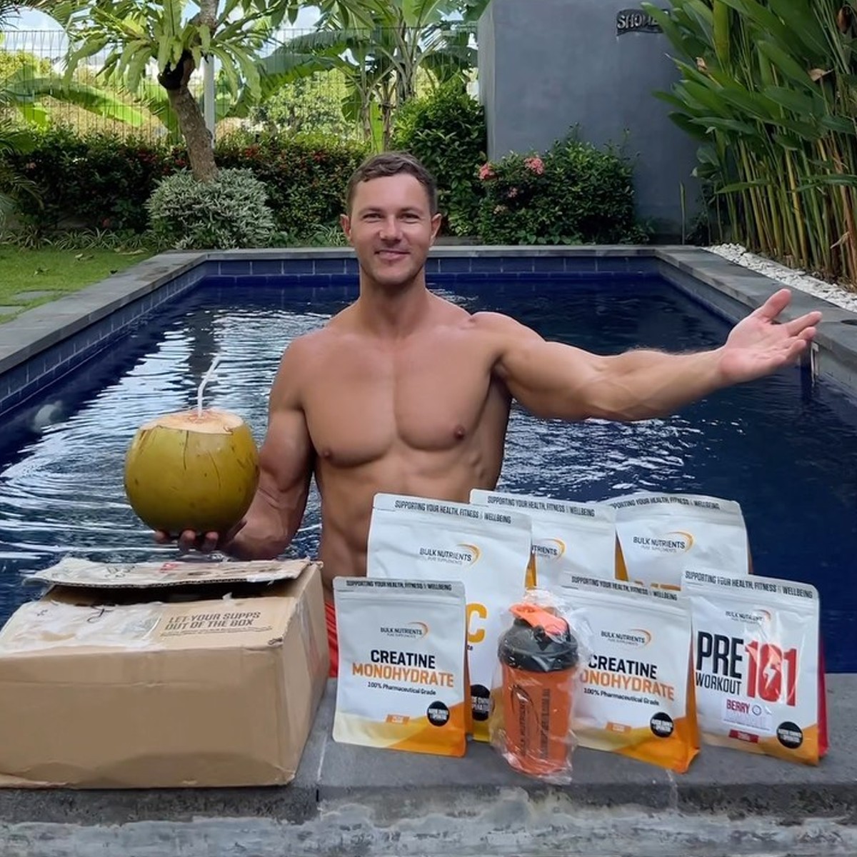 Bulk Nutrients Ambassador Ryan Van Duiven with Products by the Pool