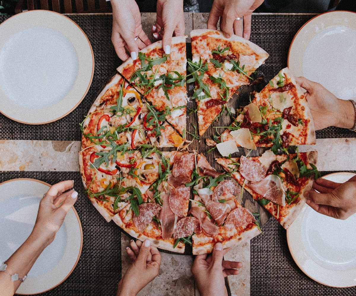 Portion sizes based on indulging with friends and sharing a meal. how many slices might you have if you were just on your own? Photo by Klara Kuliova
