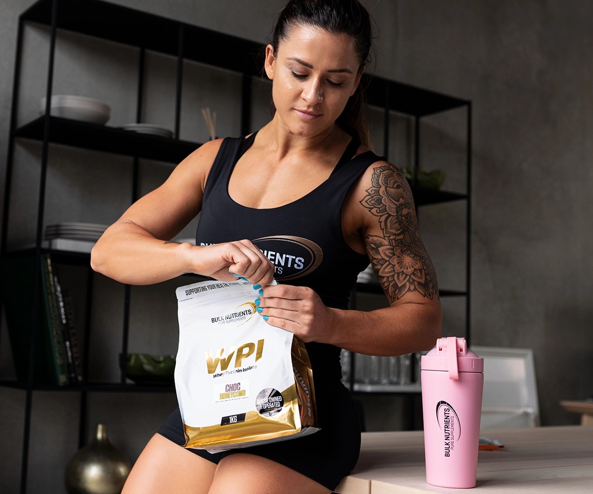 Tammie Sarkozy making a protein shake