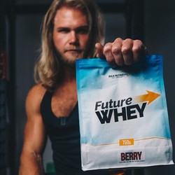 Bulk Ambassador Andrew Lutomski holding a 750g pouch of Bulk Nutrient's vegan-friendly Future Whey Berry flavour free-amino protein. Future Whey is a refreshing way to take protein... Future Whey is now 100% plant based free form amino acids and available in three great flavours (Berry, Cola and Lemonade!). Available in 750g pouches.