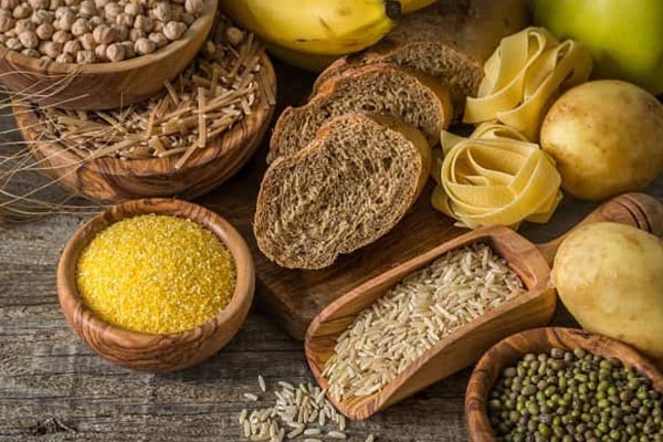 Common foods that are high in carbohydrates are bread, pasta, rice, grains, and potatoes.