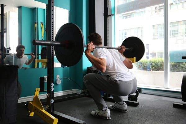 Deep squats are great for developing the strength and size of your hamstrings