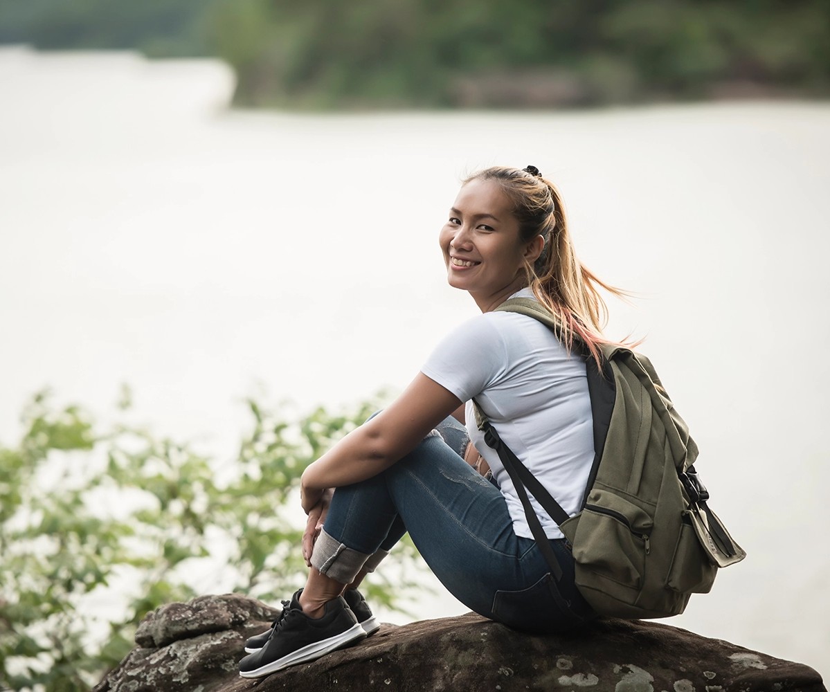 Bulk Nutrients - Blog - Woman with backpack on a rock