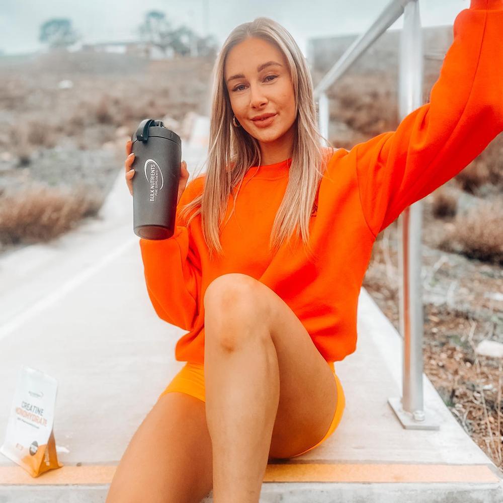 Bulk Nutrients Ambassador Chelsea Reid with Black Stainless Steel Shaker