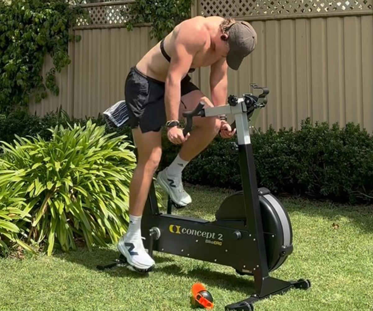 BN Ambassador Jakob Barlow on a erg bike outside