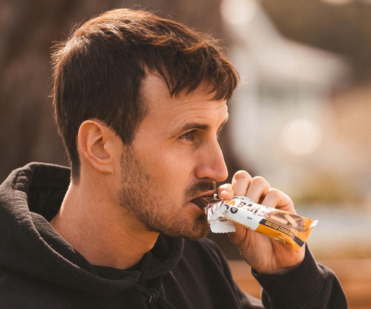 Ryan eating a Protein Bar