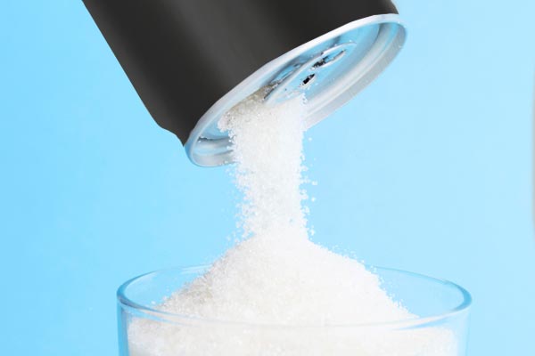 Sugar or artificial sweeteners? Sugar is very calorie-dense, so consuming drinks using artificial sweeteners in moderation is completely safe and a much lower calorie option.