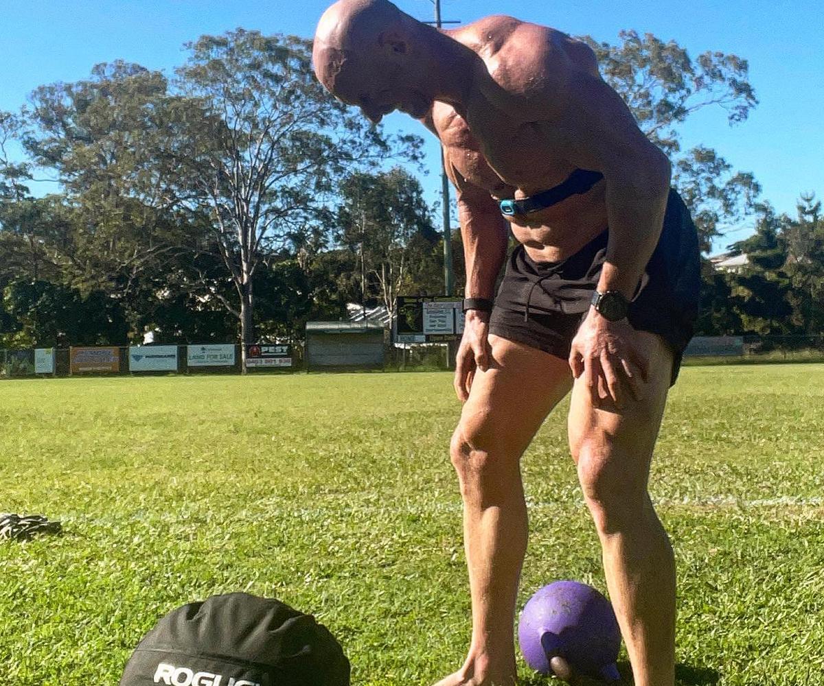 Bulk Nutrients Ambassador Bobby Dee doing a kettlebell and medicine ball workout