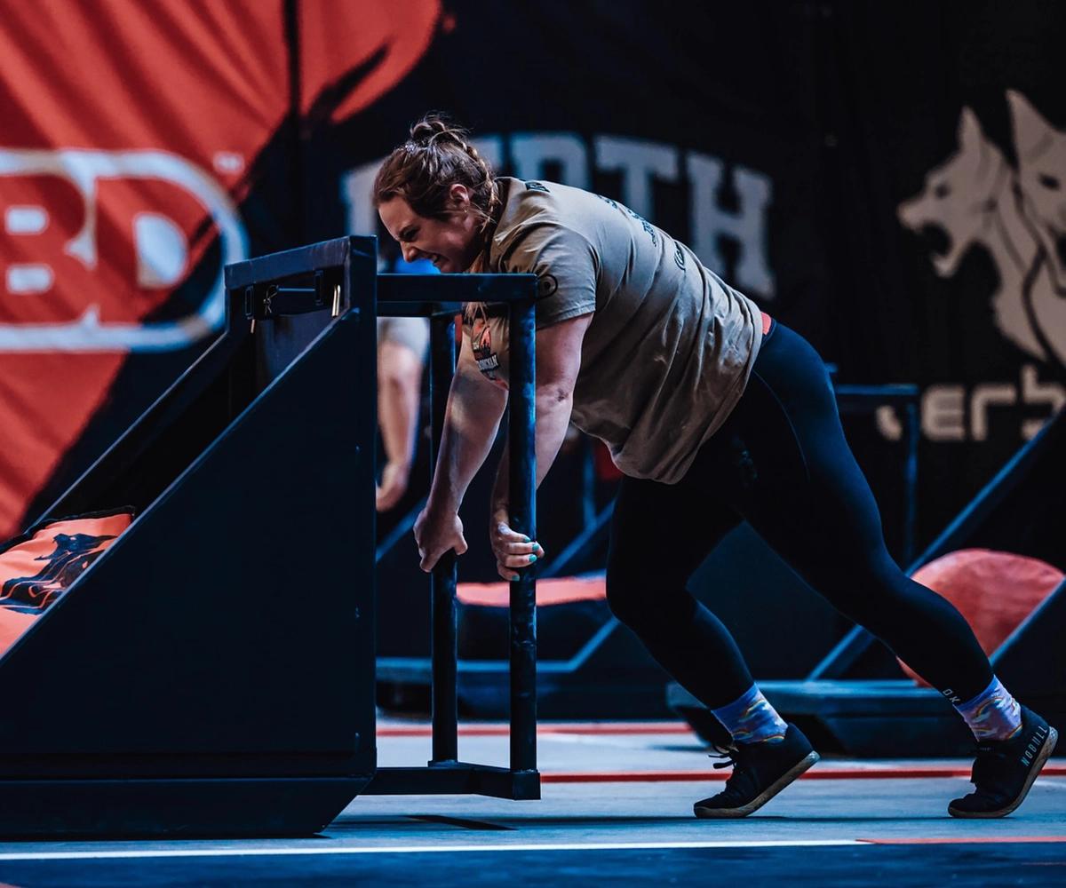 Bulk Nutrients Ambassador Katie Blunden pushing a weight sled