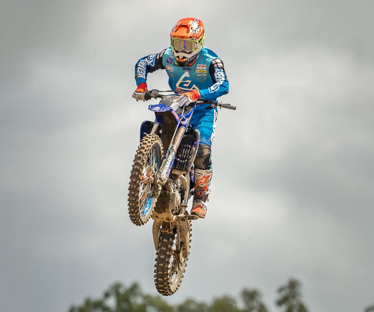 Bulk Nutrients Ambassador Rhys Budd on the bike with some air