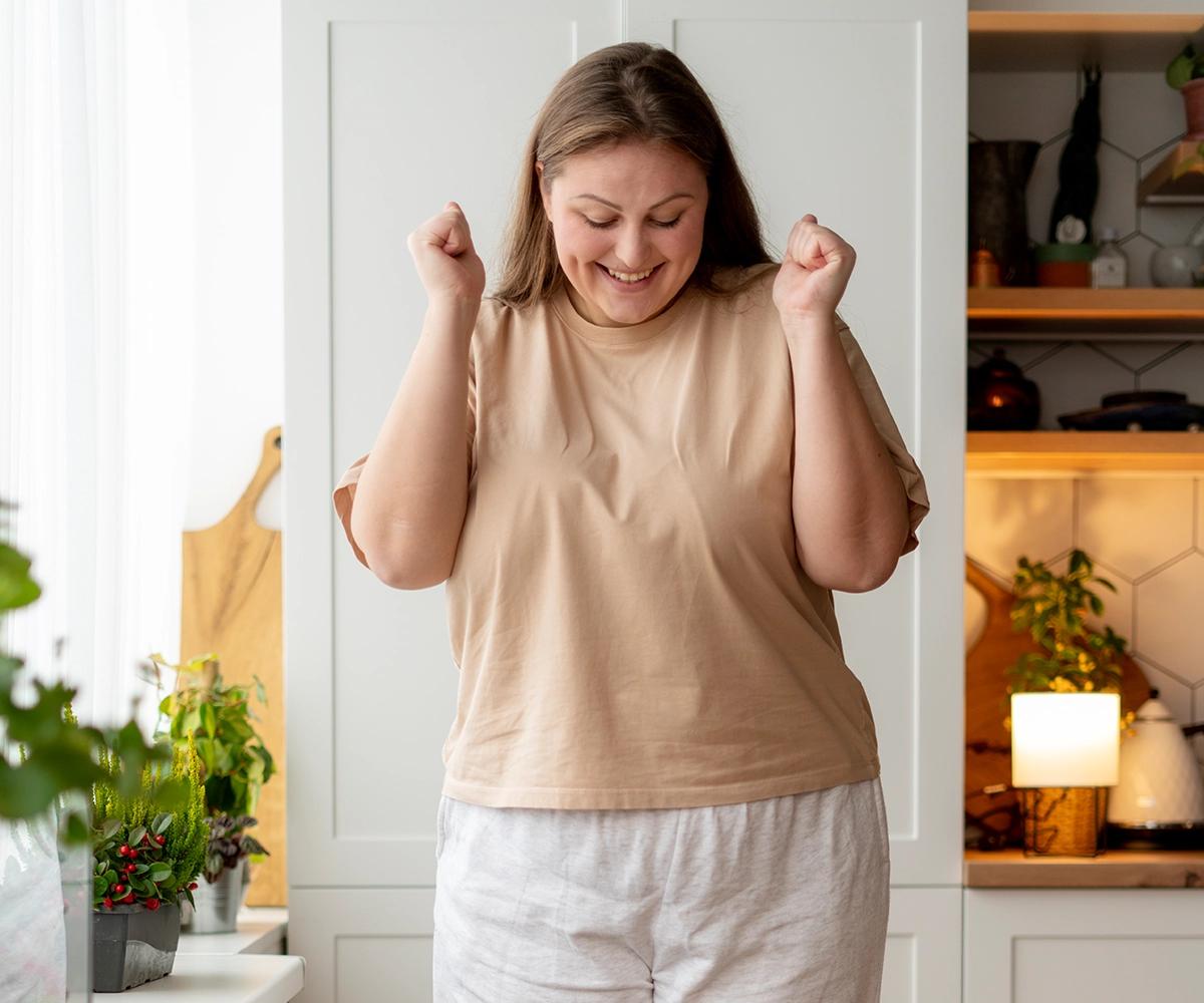 women looking down at scales