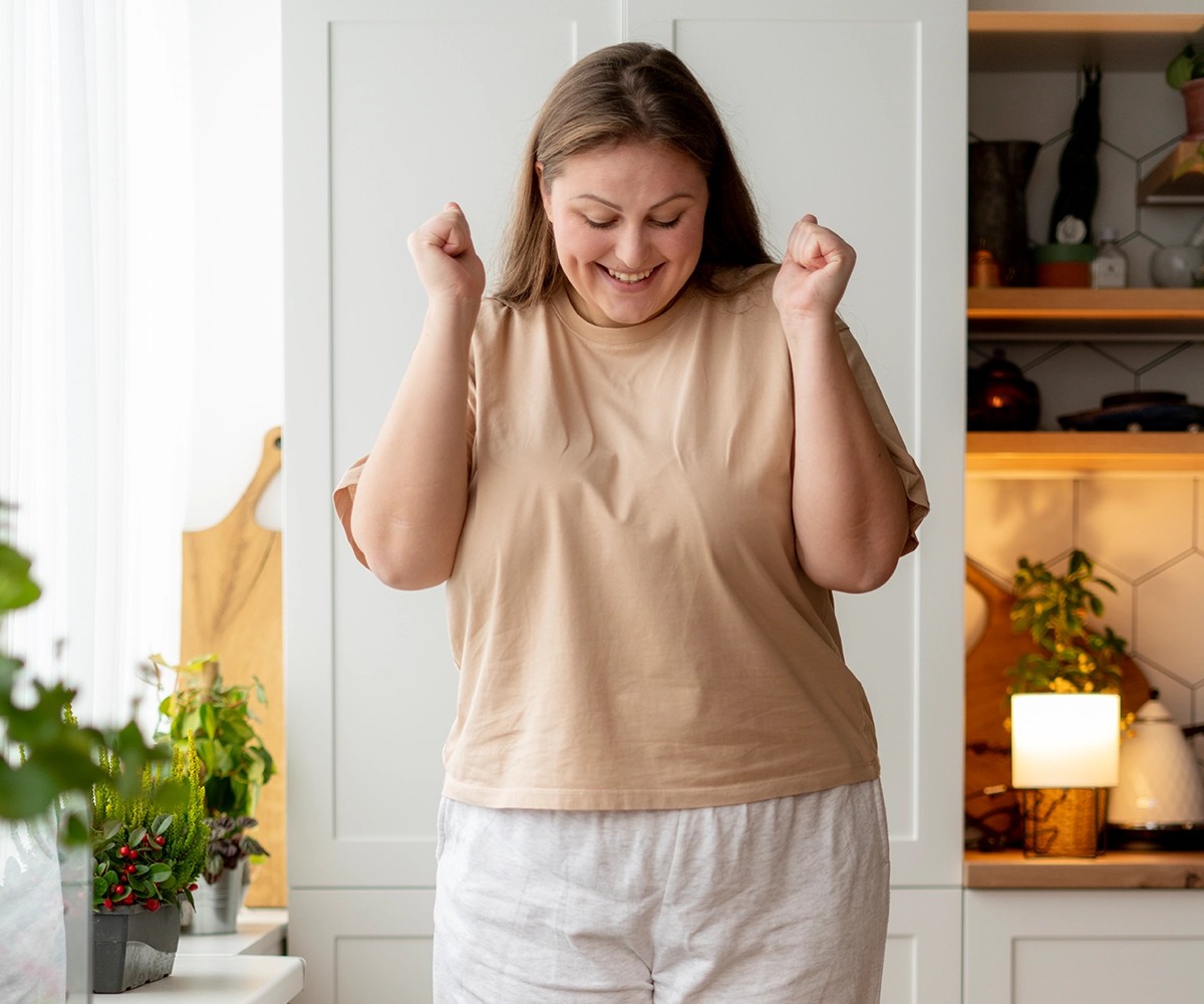 women looking down at scales