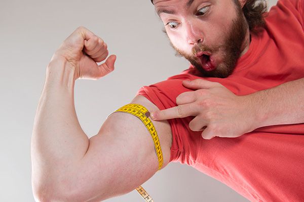 Bicep with a measuring tape