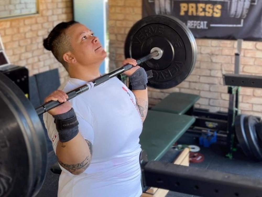 Ambassador Hani Watson powerlifting