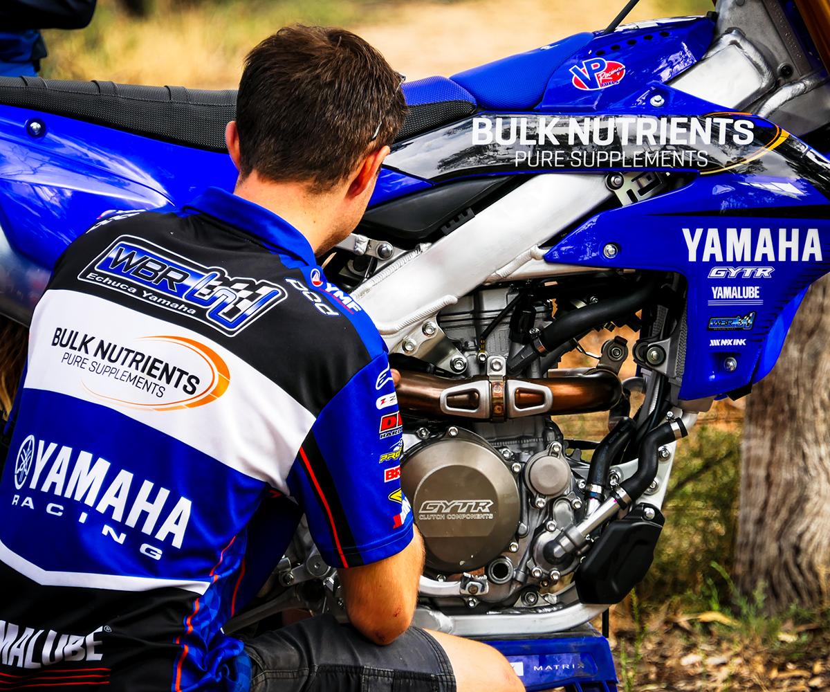 WBR Yamaha team - mechanic with bike