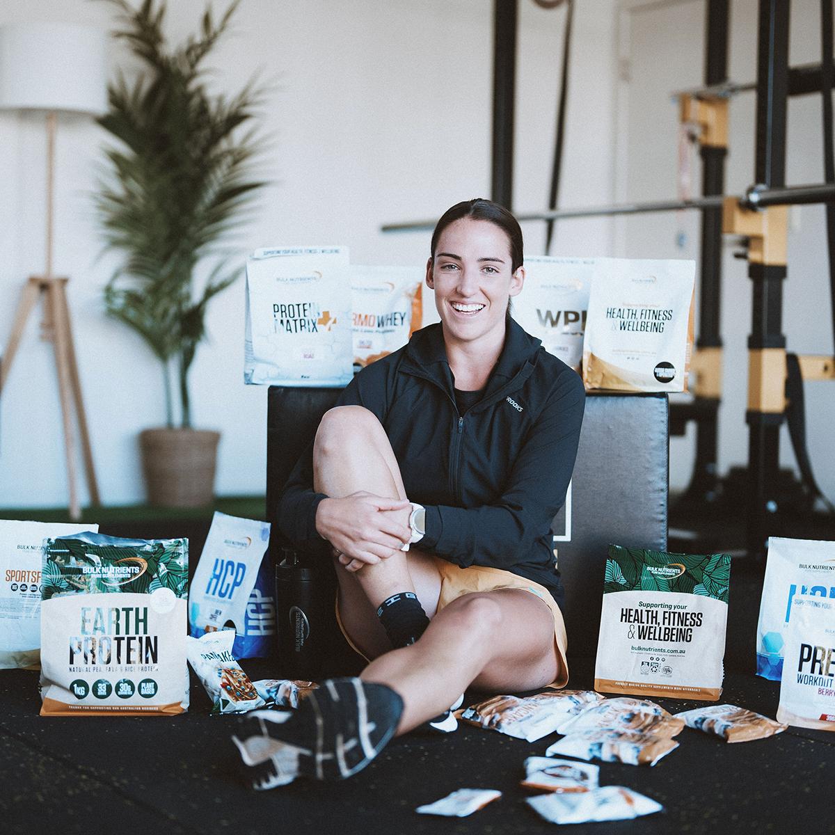 Bulk Nutrients Ambassador Jacquia Bell with Bulk Nutrients Products