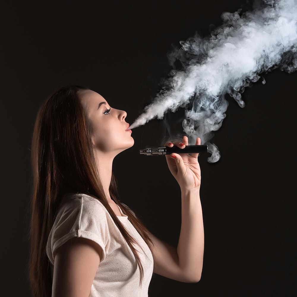 Women Vaping Image by master1305 on Freepik