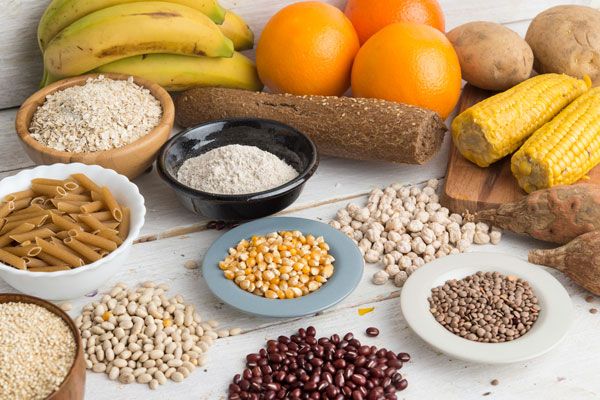 A table full of foods with high carbohydrates