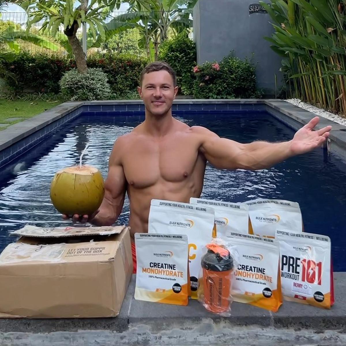 A muscular man experiencing inflammation and discomfort in his elbow.  